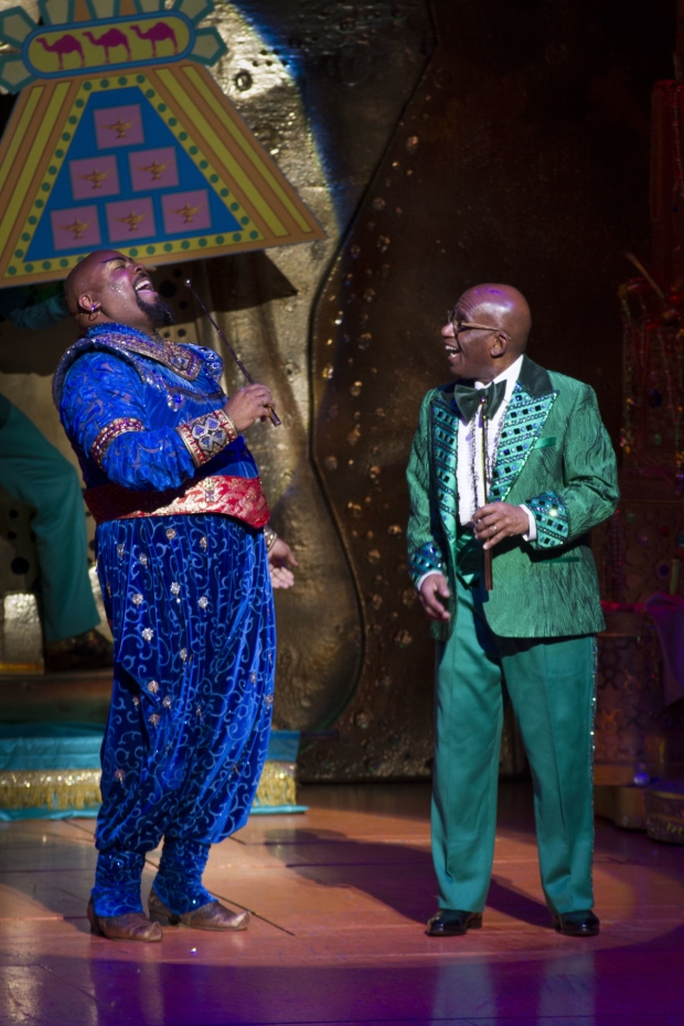 James Monroe Iglehart has a laugh with meteorologist Al Roker on stage.