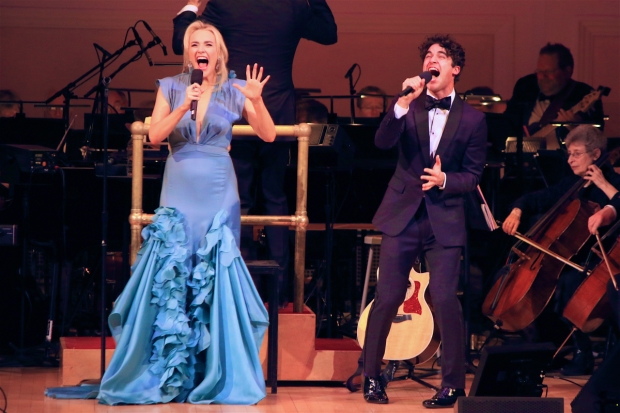 Betsy Wolfe and Darren Criss take the stage and perform a duet.