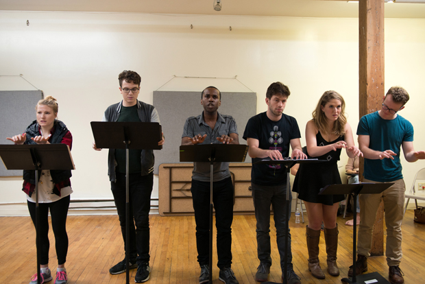A moment in rehearsal with the ensemble of The Crazy Ones.