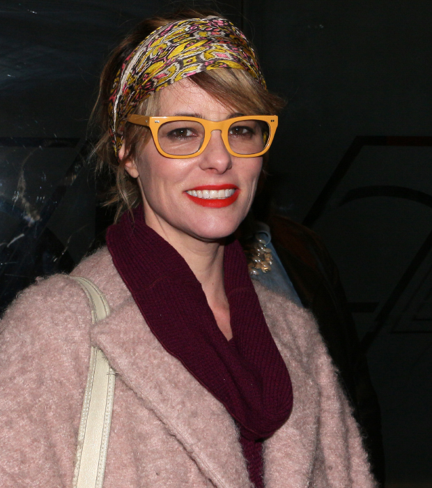 Parker Posey smiles for the cameras as she heads into Studio 54.