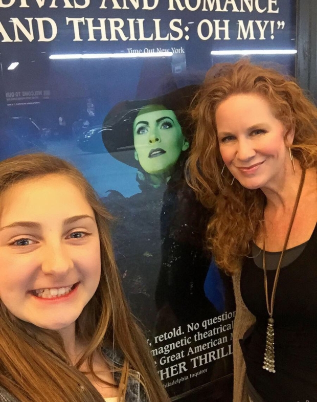 But now we get to go see Wicked!! This is me with my mom Jennifer, outside the theater!!