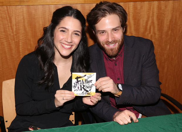 Samantha Massell and Ben Rappaport show off their Fiddler on the Roof swag.