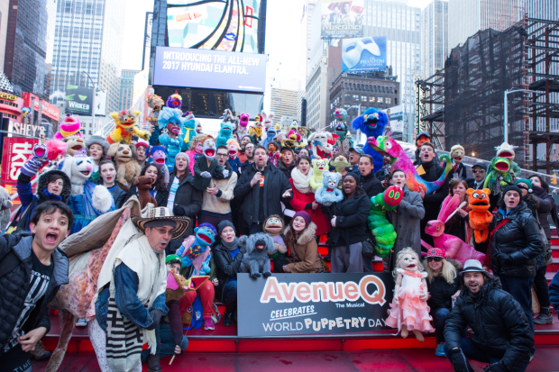 Avenue Q leads a gathering of puppets from around the city in honor of World Puppetry Day.