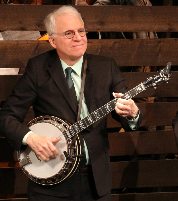 Steve Martin gives the audience a concert.