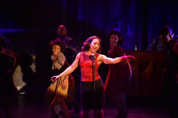 Bartley (Felicia) leads the company in an ensemble number.