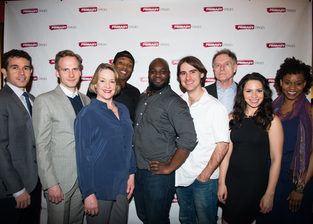 Playwright Ike Holter and director Kip Fagan (center) join their cast for a family photo.