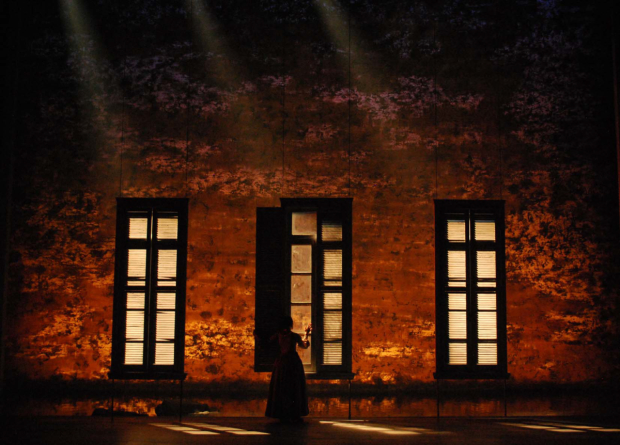 Keira Knightley stares through a window onto the Seine River in Thérèse Raquin.