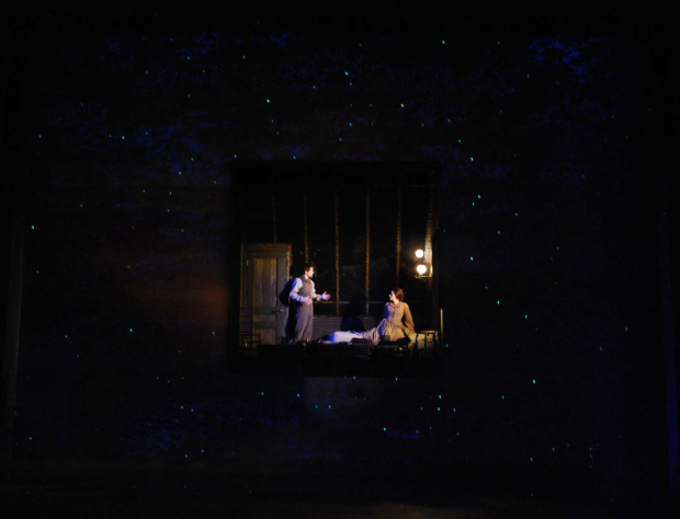 Laurent (Matt Ryan) and Thérèse (Kiera Knightley) meet secretly in Laurent&#39;s garret, which is depicted here as a small room floating high above the stage.