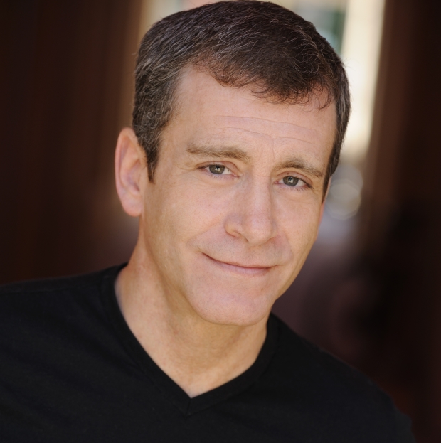 Bobby Smith plays Albin in La Cage aux Folles, directed by Matthew Gardiner, at Signature Theatre.