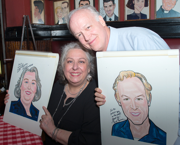 Jayne Houdyshell and Reed Birney hold up their Sardi&#39;s caricatures.