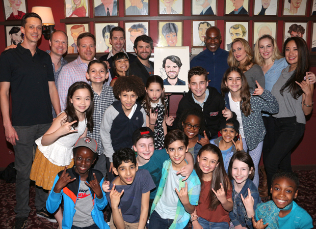 Cast members from School of Rock join Alex Brightman for a family photo.