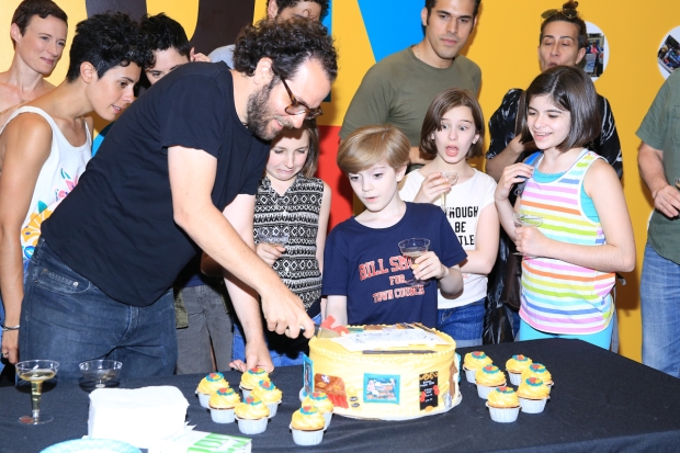 Director Sam Gold cutts a cake celebrating Fun Home&#39;s 500th performance.