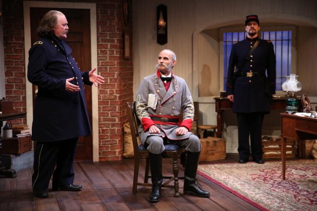 General Butler (Ames Adamson) discusses Mallory with Major Cary (David Sitler) as Lieutenant Kelly (Benjamin Sterling) looks on.  