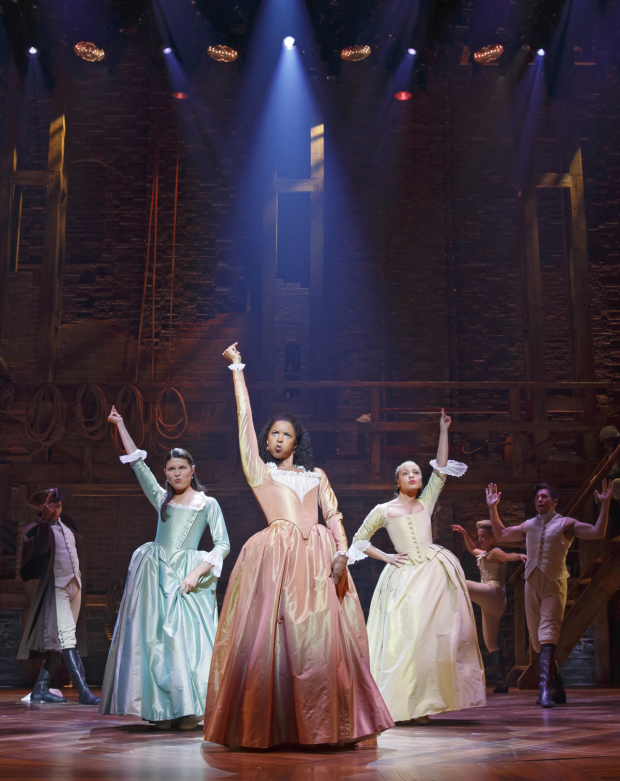 Renée Elise Goldsberry (center) with Phillipa Soo and Jasmine Cephas Jones in a scene from Hamilton on Broadway.