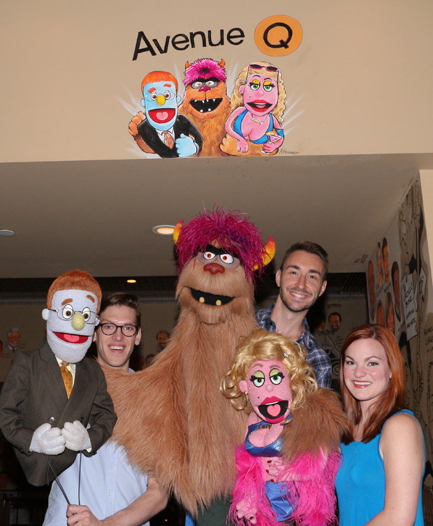 Rod, Ben Durocher, Trekkie Monster, Jed Resnick, Lucy T. Slut, and Elizabeth Ann Berg pose with the new Avenue Q portrait at the Palm Restaurant.