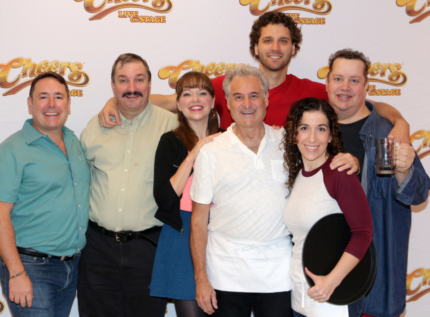 Director Matt Lenz (left) with the cast of Cheers Live on Stage: Buzz Roddy (Cliff), Jillian Louis (Diane), Barry Pearl (Coach), Grayson Powell (Sam), Sarah Sirota (Carla), and Paul Vogt (Norm).