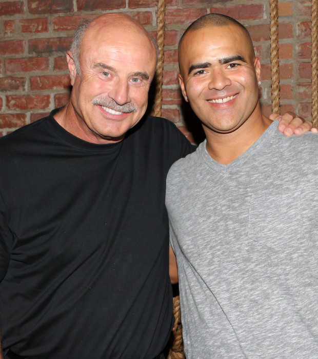 Dr. Phil McGraw poses with Hamilton Tony nominee Christopher Jackson, who stars in McGraw&#39;s upcoming television series, Bull.