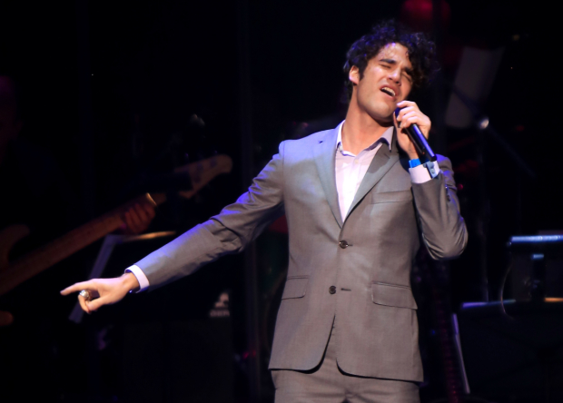 Darren Criss singing at the Voices for the Voiceless concert.