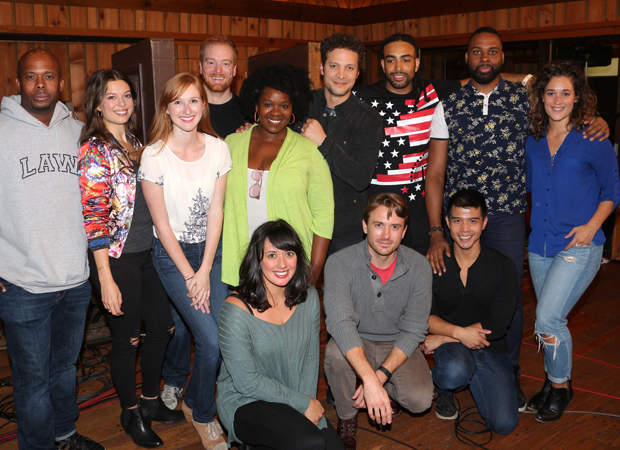 The cast of In Transit gathers in the recording studio.