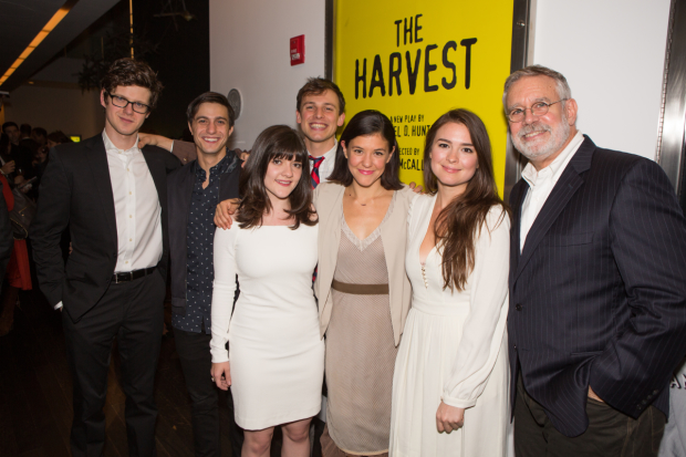 The cast of The Harvest poses for a photo on their opening night.