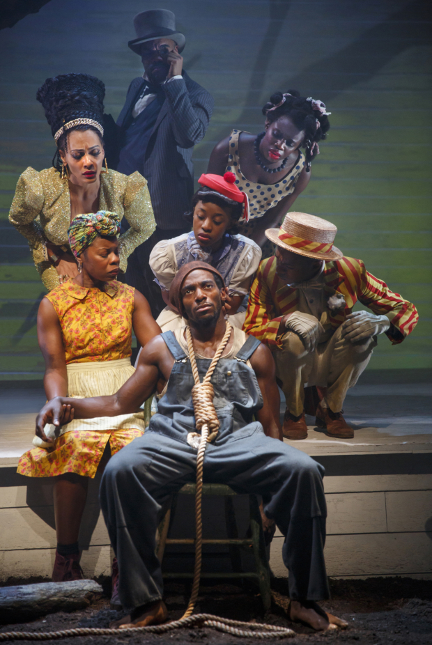 Daniel J. Watts (center) star in The Death of the Last Black Man in the Whole Entire World AKA the Negro Book of the Dead by Suzan-Lori Parks at Signature Theatre.