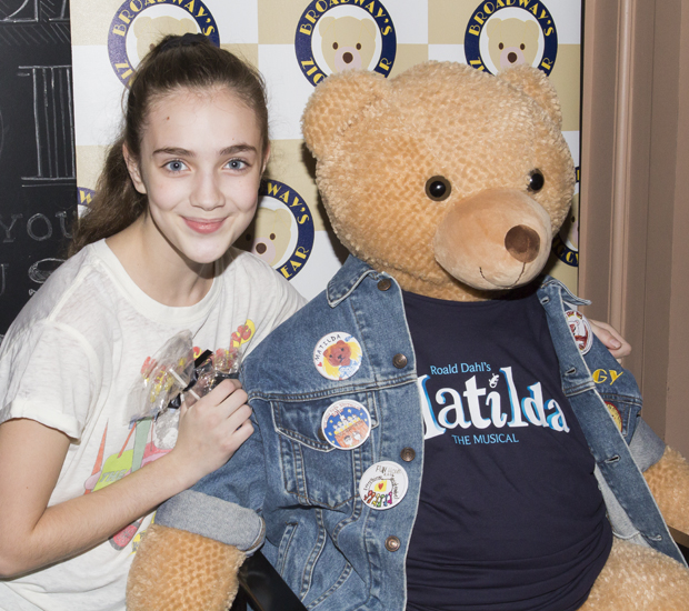 Matilda cast member Talia Ryder places her commemorative badge on the Actors Fund&#39;s Ziggy Bear.