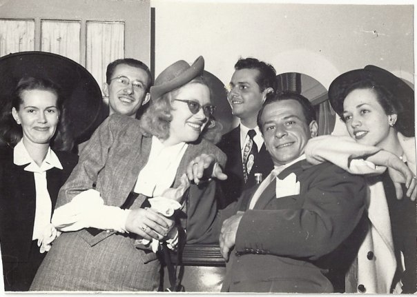 Piper&#39;s mother and father (center), surrounded by a group of their show business friends. 