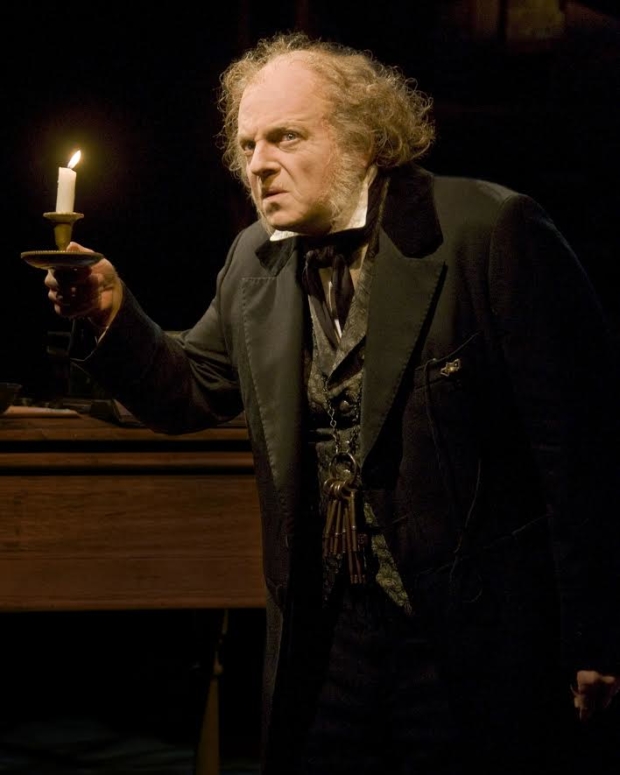 Caption: Jeffrey Bean stars as Ebenezer Scrooge in Alley Theatre's production of A Christmas Carol – A Ghost Story of Christmas, directed by James Black.
