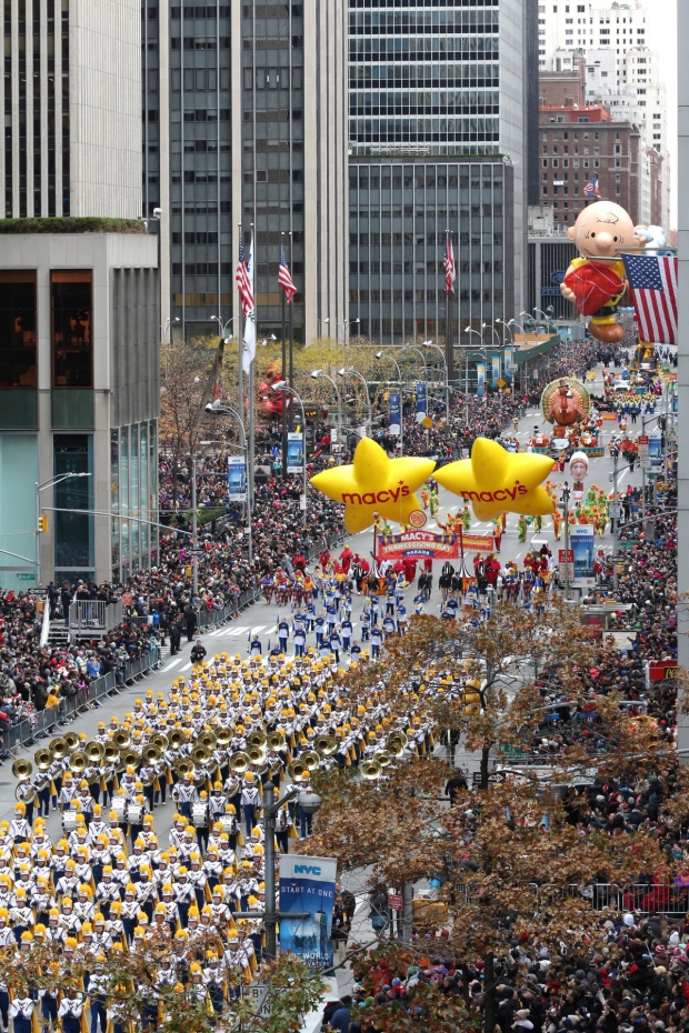 The 90th annual Macy&#39;s Thanksgiving Day Parade makes its way down 6th Avenue in Manhattan.
