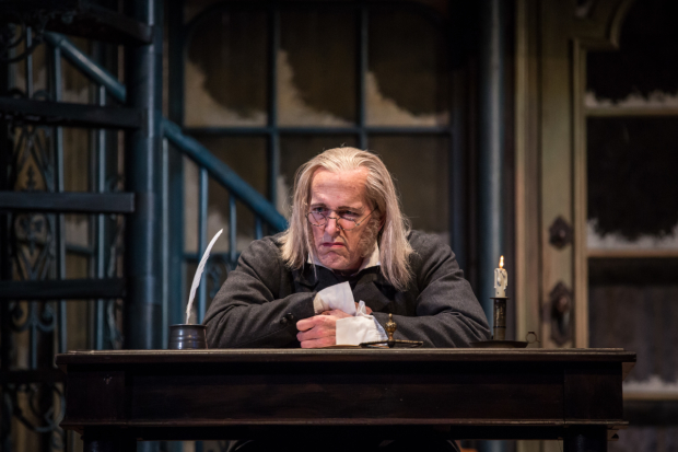 Larry Yando as Ebenezer Scrooge in A Christmas Carol, directed by Henry Wishcamper, at the Goodman Theatre.