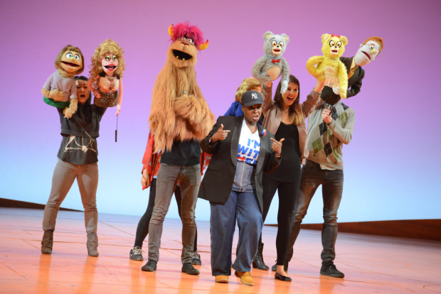 The cast of Avenue Q performs.