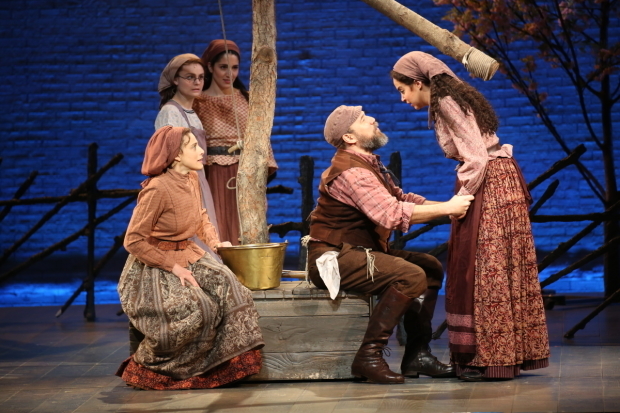 Judy Kuhn and Danny Burstein as Golde and Tevye with onstage daughters Melanie Moore, Samantha Massell, and Alexandra Silber.