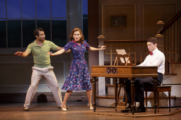 Corbin Bleu, Lora Lee Gayer, and Bryce Pinkham perform around the piano in  Holiday Inn.