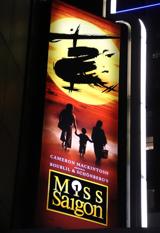 The Miss Saigon marquee is lit up at the Broadway Theatre.