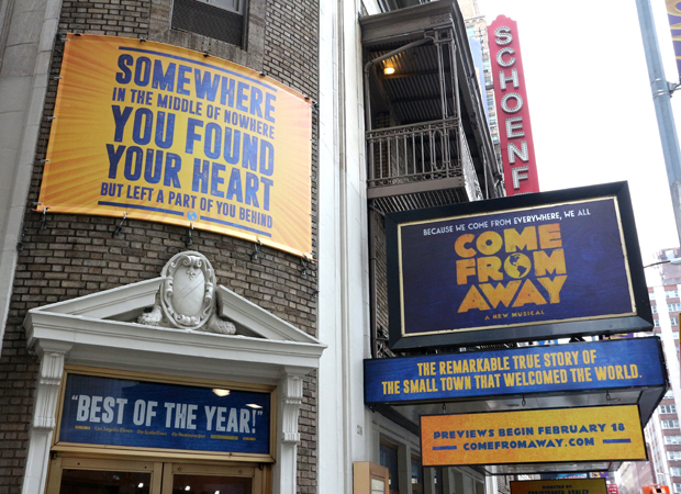 The Come From Away front of house artwork at the Schoenfeld Theatre.