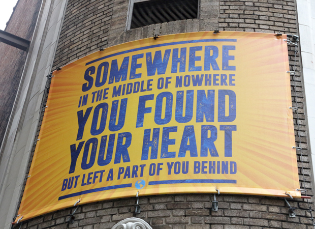 A poster on the front of the Schoenfeld Theatre.