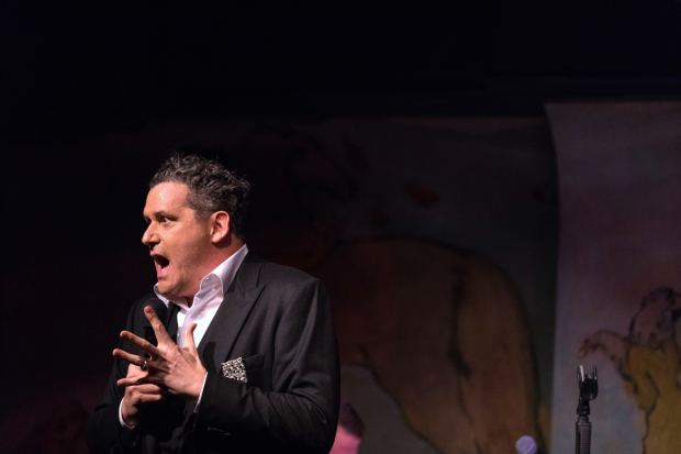 Isaac Mizrahi regales the audience at Café Carlyle with one of his dishy anecdotes. 
