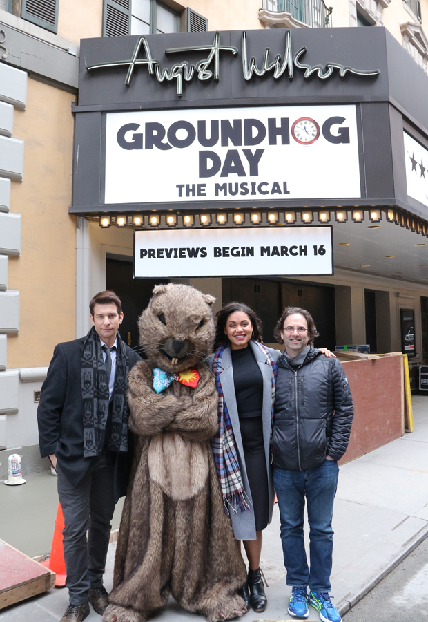 Andy Karl, Mr. Groundhog, Barrett Doss, and Danny Rubin poses under the August Wilson Theatre marquee.