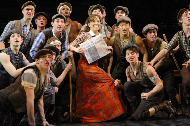 Kara Lindsay (center) leads the production number &quot;King of New York&quot; in the 2012 Broadway production of Newsies.