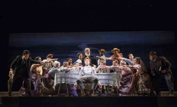 Nicholas Barasch (center) plays Huckleberry Finn in the Encores! production of Big River.