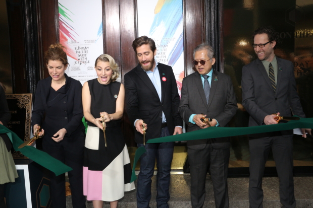 Annaleigh Ashford and Jake Gyllenhaal (center) cut the ribbon on the newly reopened Hudson Theatre.