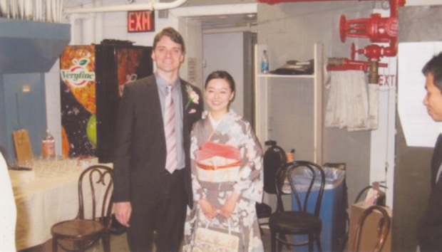 Dan Urness and Minami Yusui celebrate their wedding in the basement of the Broadway Theatre.