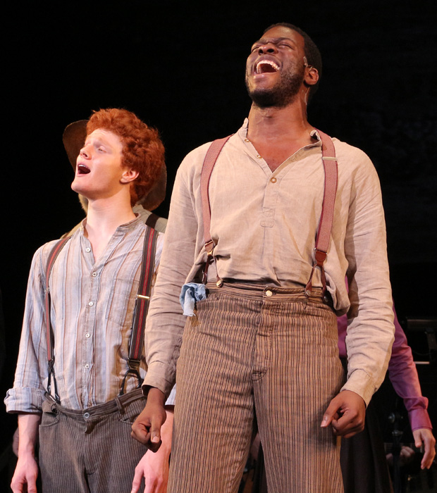 Nicholas Barasch and Kyle Scatliffe sing &quot;Muddy Water&quot; during the final curtain call of Big River at New York City Center.