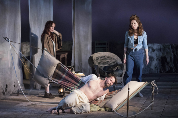Amanda Plummer (Hannah Jelkes), Bill Heck (Reverend T. Lawrence Shannon), and Dana Delany (Maxine Faulk) in The Night of the Iguana, directed by Michael Wilson, at the American Repertory Theater.