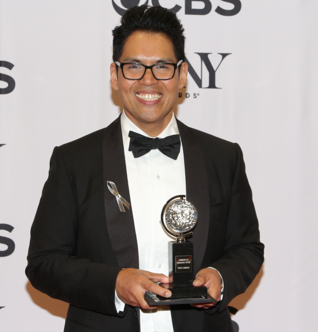 Clint Ramos with his 2016 Tony Award for the costumes of Eclipsed.
