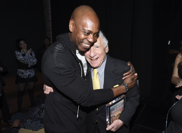 Honoree Mel Brooks gets a hug from Dave Chappelle.