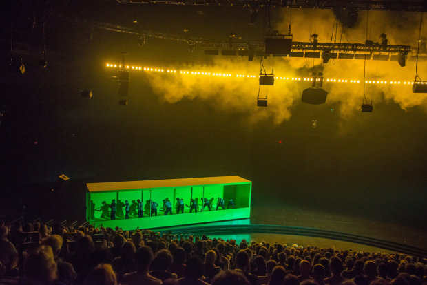Stewart Laing&#39;s set for The Hairy Ape rotates around the audience at the Park Avenue Armory on a conveyor belt.