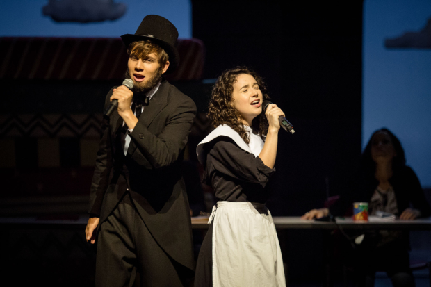 Howie (Austin P. McKenzie) and Diwata (Sarah Steele) perform a musical about Abraham Lincoln and Mary Warren in Speech &amp; Debate.