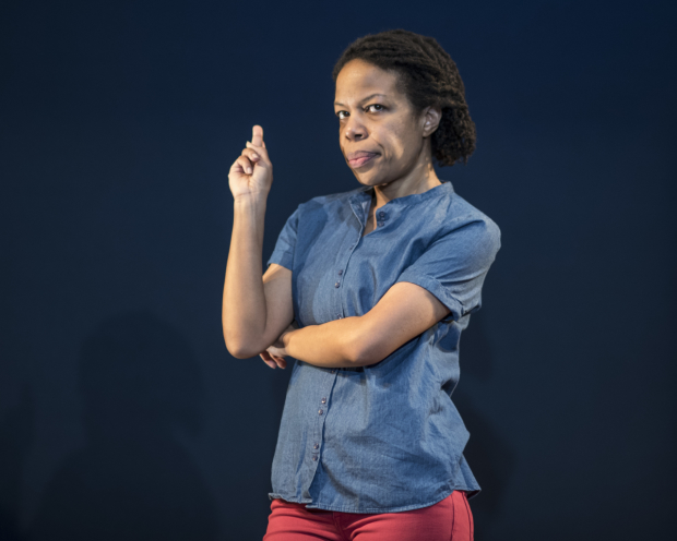 Nilaja Sun in her solo show Pike St., directed by Ron Russell, at Woolly Mammoth Theatre.