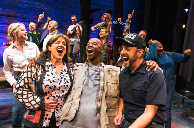 The cast of Come From Away come together for a fun musical number.